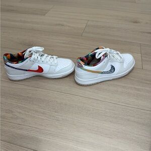 Nike Kids White Sneakers with Red and Blue Accents